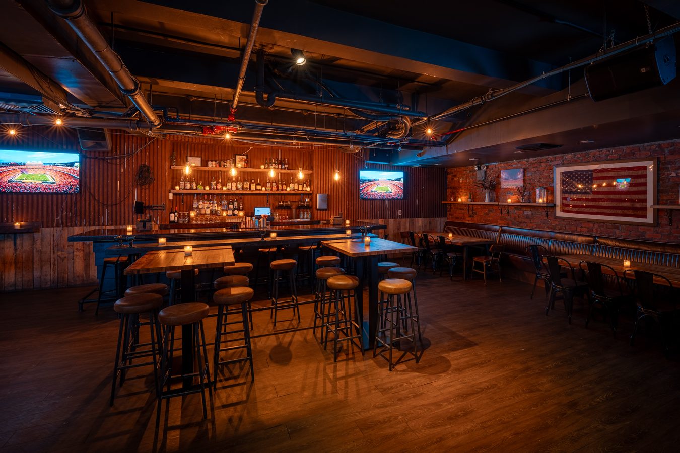 The Cellar Bar, exposed pipework and TV wall